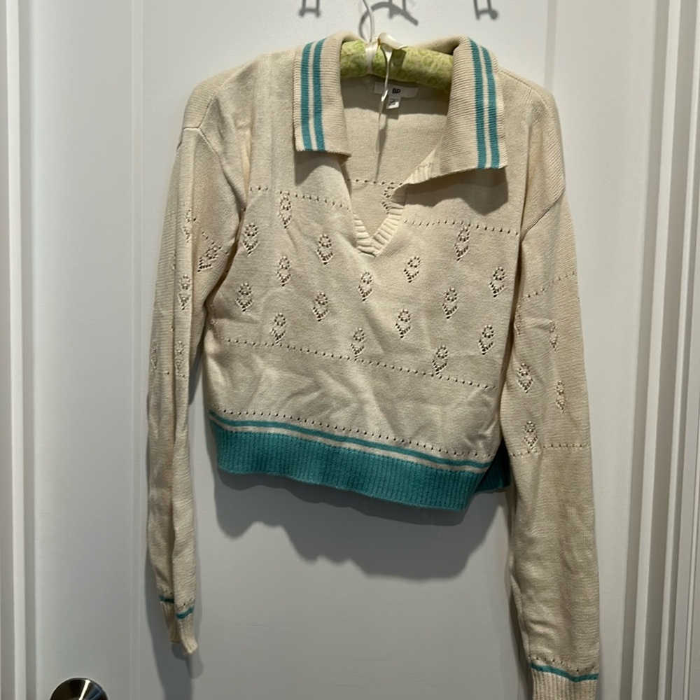 100% Cotton, cropped, pointelle sweater. Cream and teal.